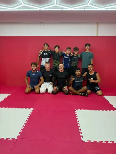 The next generation training together on the mats.